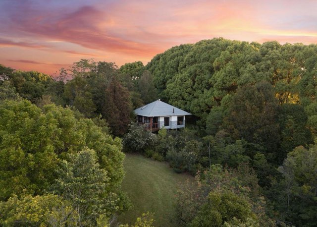 Hinterland cottage at sunset above the plateau